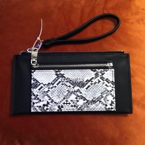 Steve Madden small clutch with card holder.